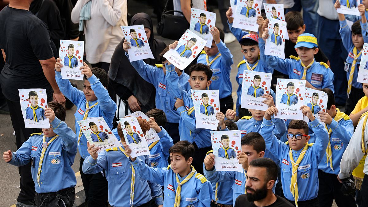 alert-–-lebanese-scouts-line-the-streets-in-grief-for-young-boy-killed-in-hezbollah-pager-explosions-that-left-12-dead