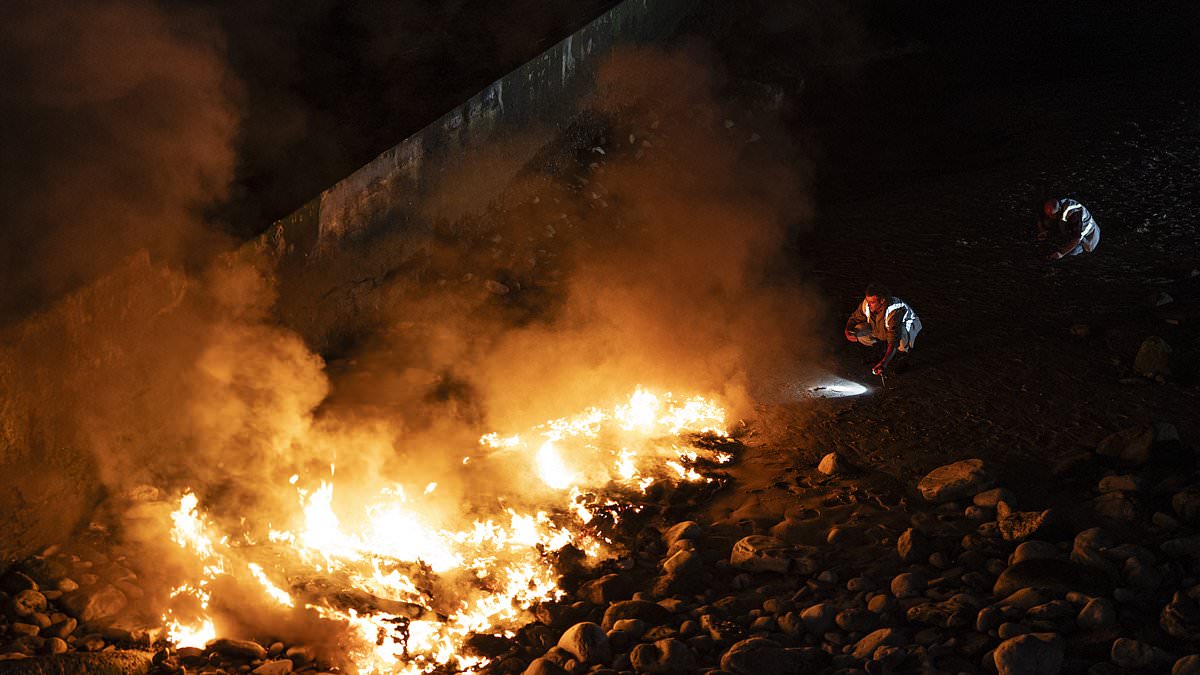 alert-–-migrant-boat-destined-for-a-voyage-over-the-channel-to-britain-burns-in-france-as-police-watch-on