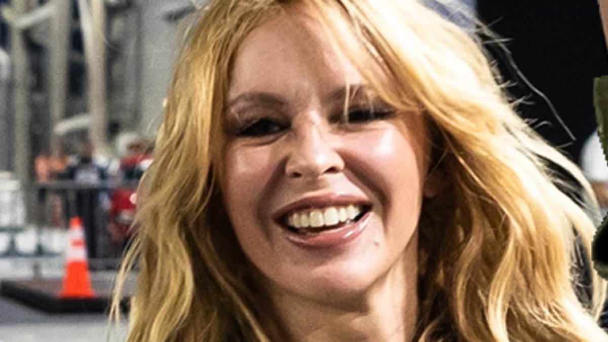 alert-–-kylie-minogue-makes-a-stylish-appearance in-a-green-cargo-jumpsuit-after-performing-at-the-singapore-grand-prix-ahead-of-her-new-tour