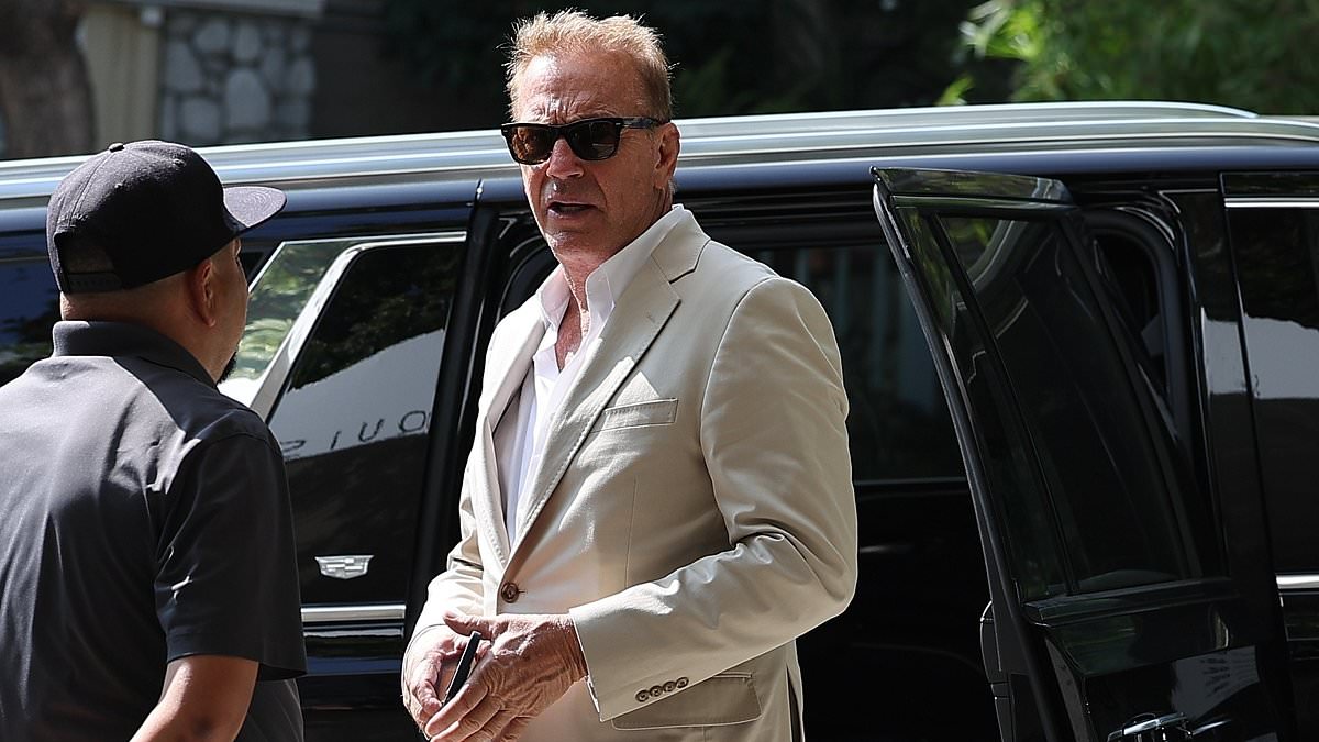 alert-–-kevin-costner-rocks-a-rather-stylish-look-in-a-beige-suit-while-arriving-at-the-sunset-marquis-hotel-in-los-angeles