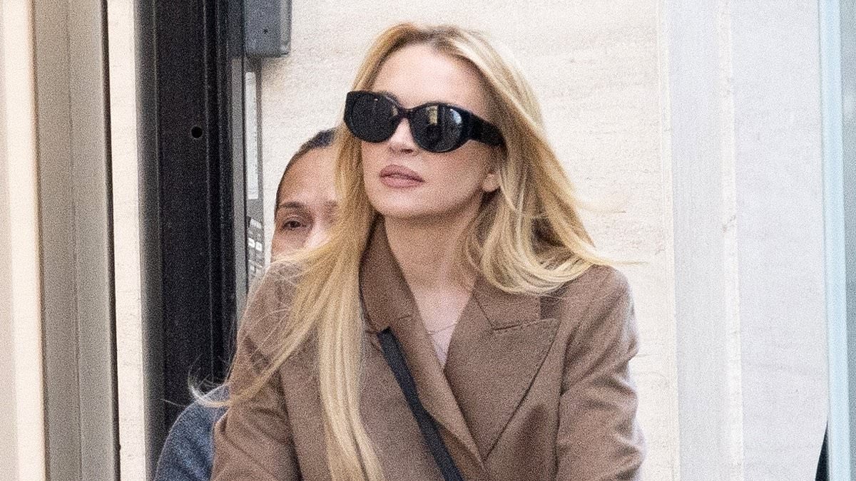 alert-–-lindsay-lohan-looks-effortlessly-chic-in-brown-trench-coat-as-she-enjoys-family-stroll-in-paris-with-husband-bader-shammas-and-son-luai