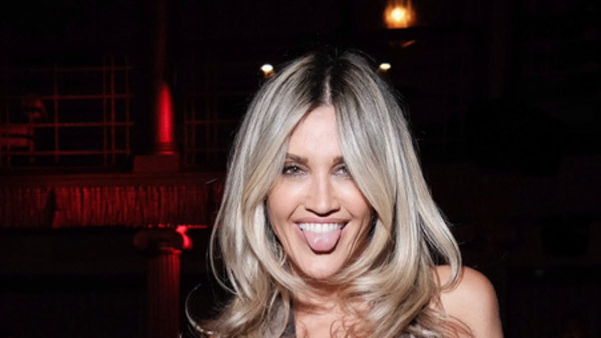 alert-–-ashley-roberts-puts-on-a-daring-display-in-a-sheer-cut-out-camo-dress-as-she-enjoys-star-studded-launch-of-cabaret-bar-lio