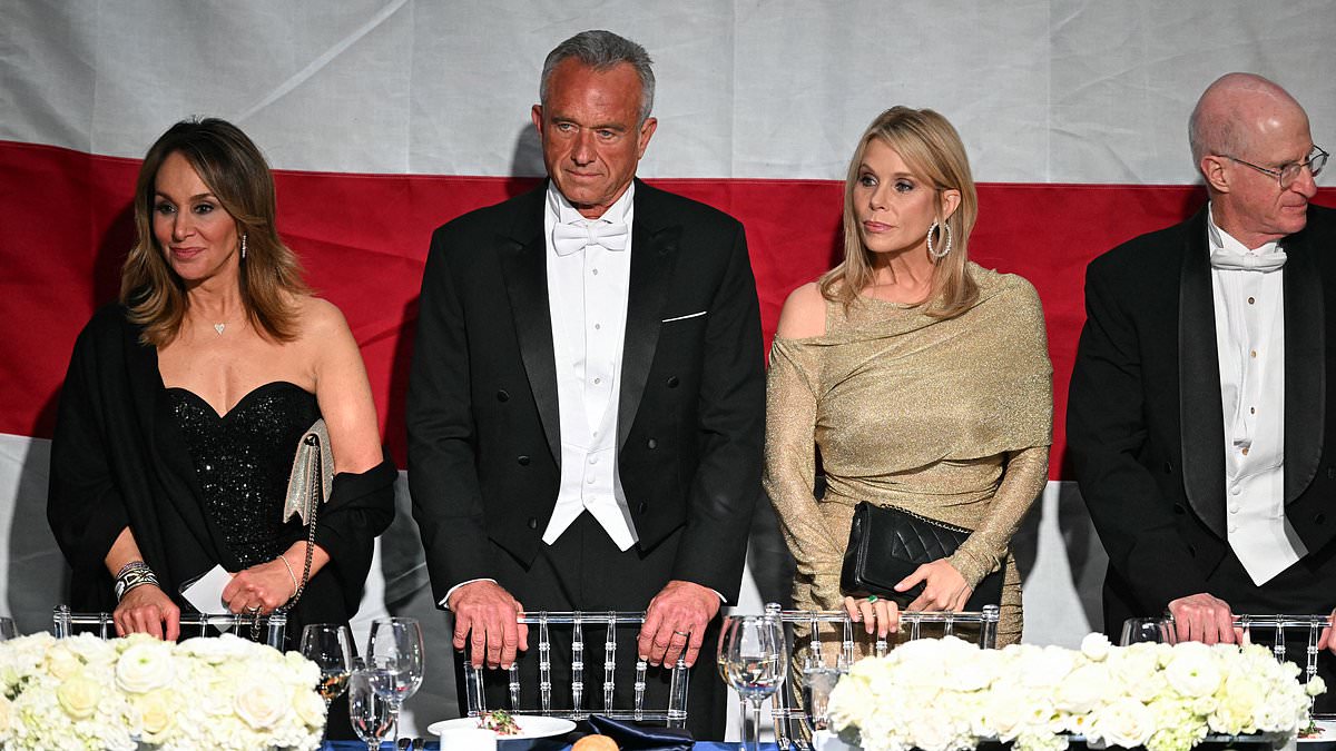 alert-–-rfk-jr-and-wife-cheryl-hines’-tense-exchange-as-they-put-on-united-front-at-al-smith-charity-dinner