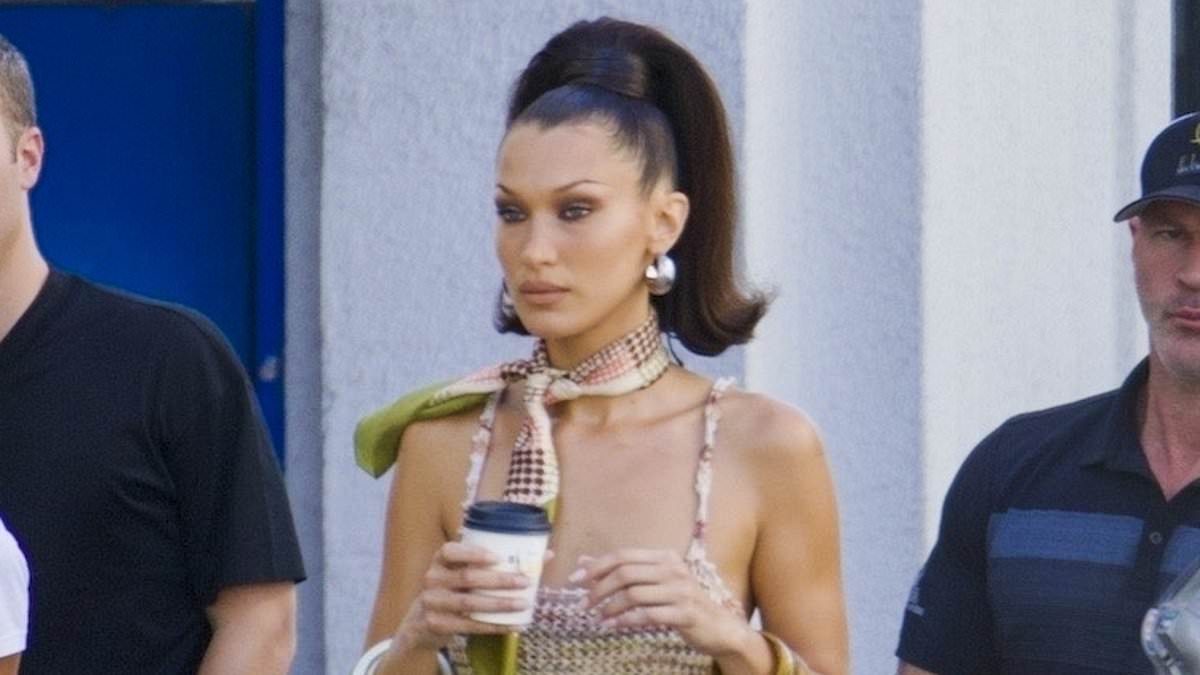 alert-–-bella-hadid-looks-70s-chic-in-bell-bottom-jeans-and-crop-top-for-photoshoot-in-la