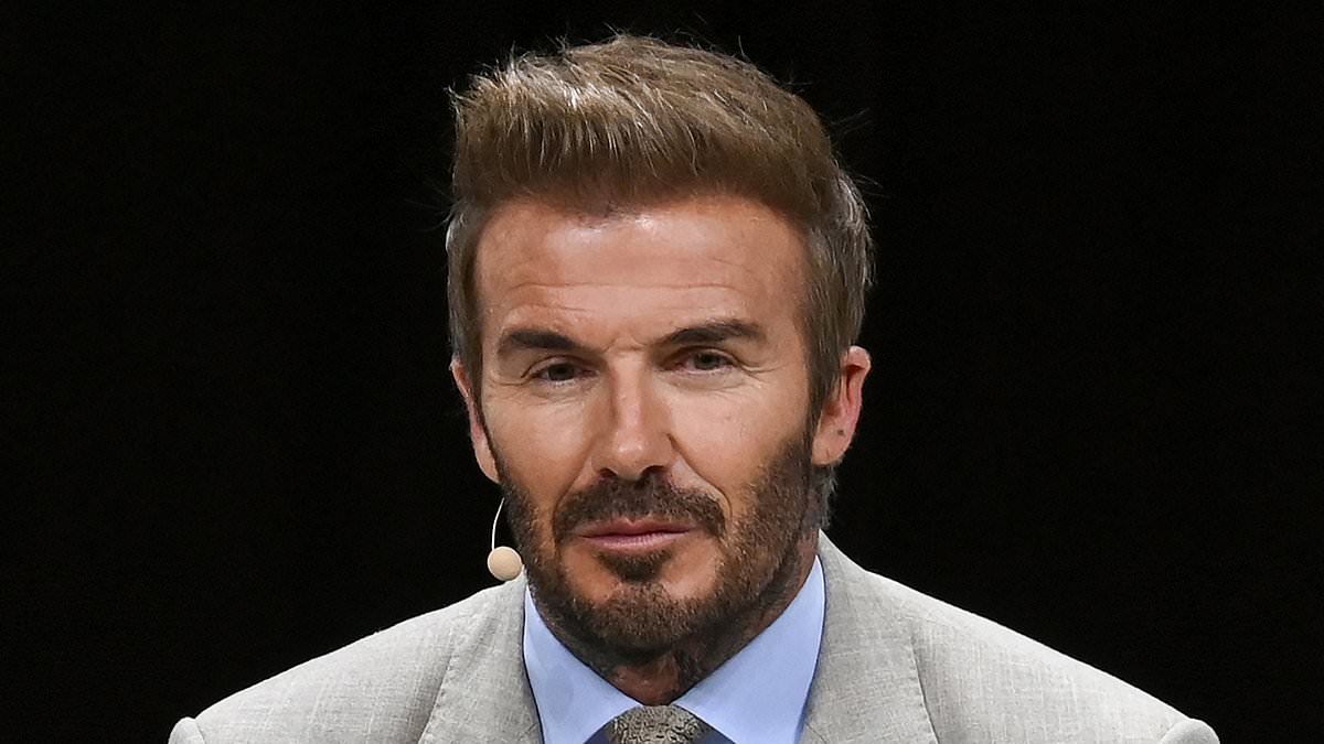 alert-–-david-beckham-looks-dapper-in-a-grey-suit-and-knit-tie-as-he-makes-surprise-appearance-at-a-launch-event-to-support-beloved-brand-in-singapore