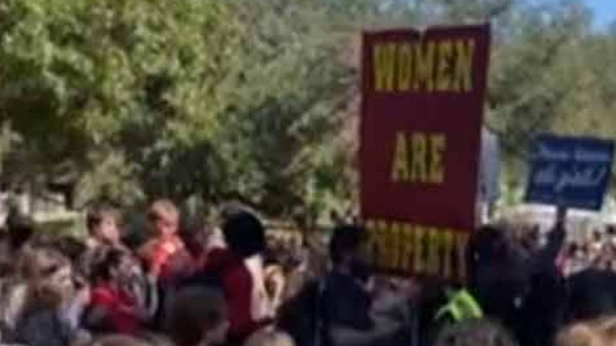 alert-–-protesters-hold-up-disturbing-‘women-are-property’-signs-at-texas-college-campus