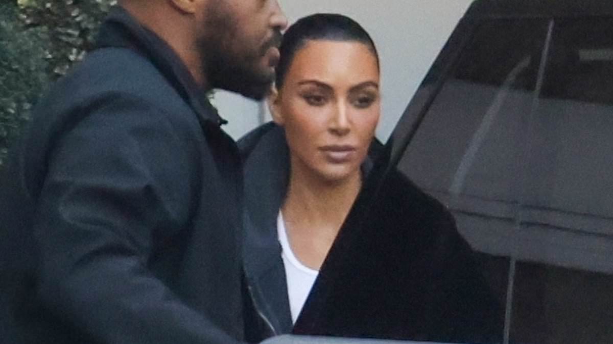 alert-–-kim-kardashian-sports-edgy-black-trench-coat-as-she-visits-skin-care-clinic-in-beverly-hills