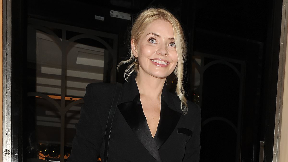 alert-–-holly-willoughby-cuts-a-chic-figure-in-a-black-suit-as-she-joins-fur-coat-clad-alex-scott-at-glitzy-dinner-party