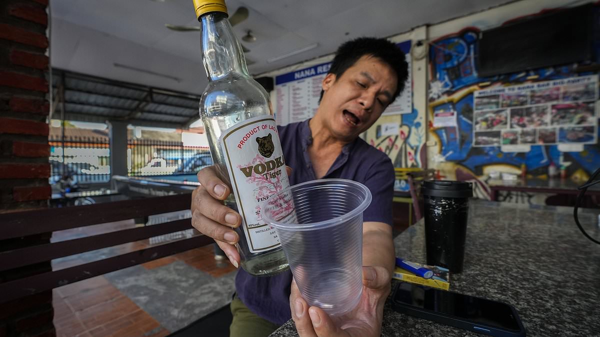 alert-–-laos-bartender-who-gave-100-free-tiger-vodka-shots-denies-his-drinks-are-behind-‘methanol-poisonings’-that-have-killed-four-and-left-11-others-in-hospital