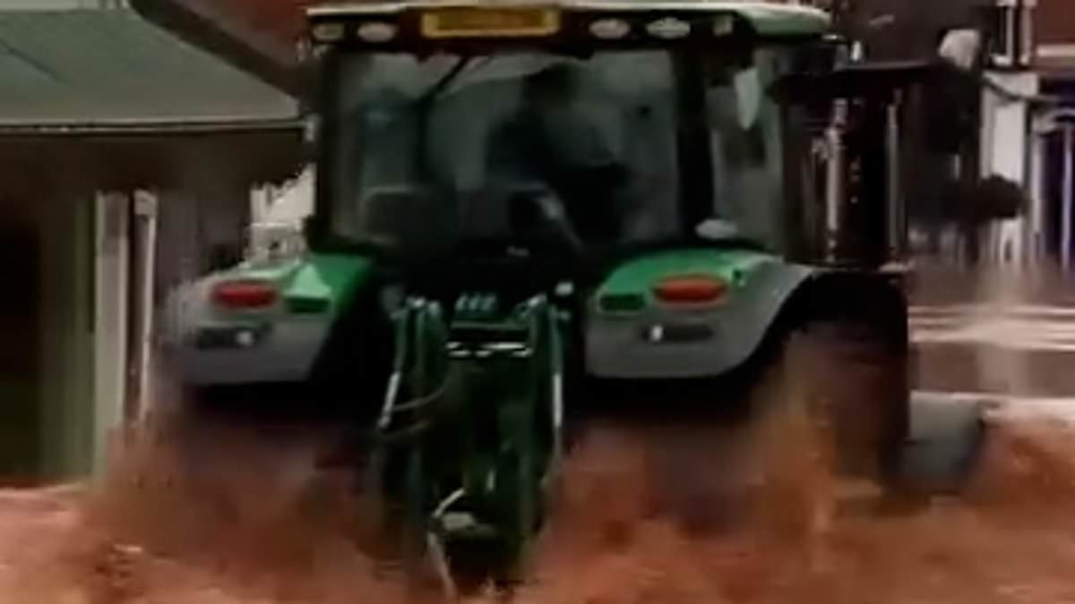 alert-–-moment-‘tosser’-tractor-driver-sends-‘wave-of-floodwaters-through-tenbury-shop-windows’-amid-storm-bert’s-devastation