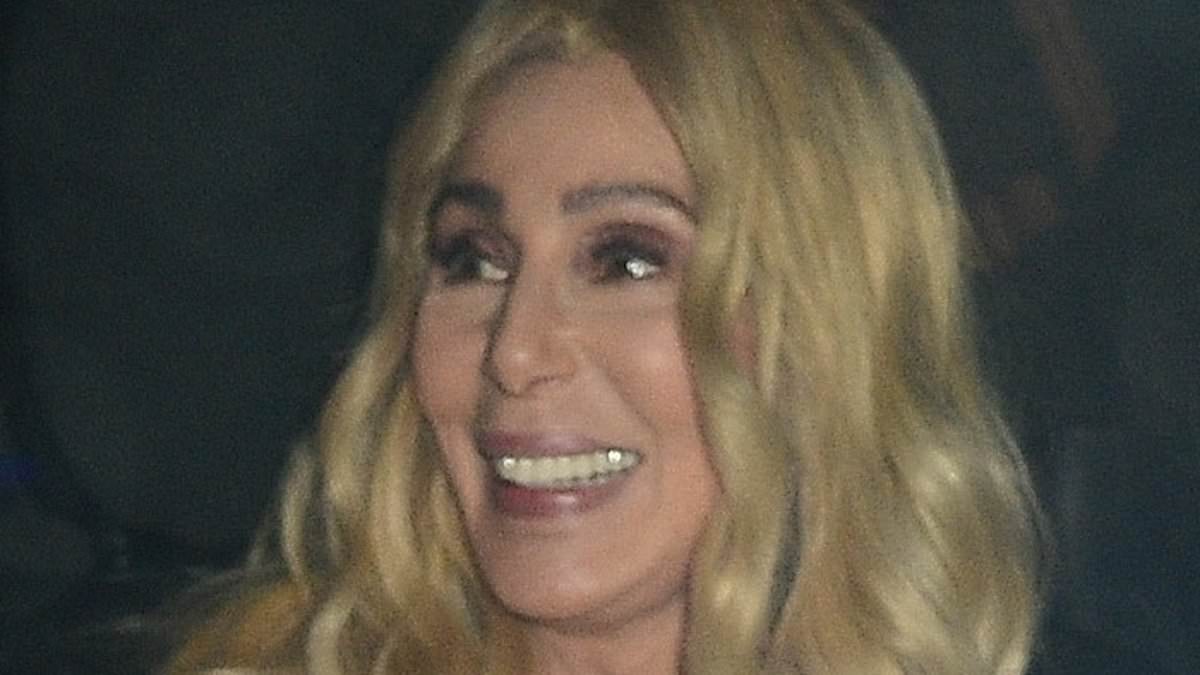 alert-–-cher,-78,-shows-off-her-age-defying-visage-and-new-blonde-hair-as-she-leaves-the-theatre-after-discussing-her-memoir-in-one-off-show-in-london