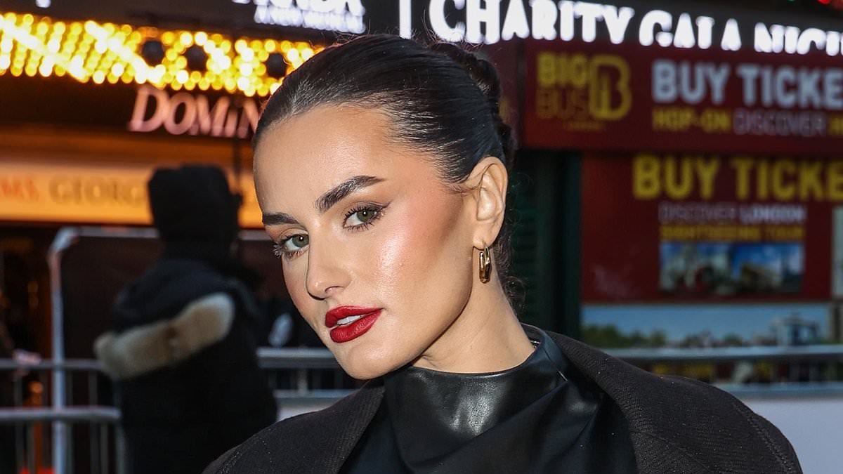 alert-–-amber-davies-sets-pulses-racing-in-a-leather-dress-and-matching-gloves-as-she-arrives-at-the-devil-wears-prada:-the-musical-opening-night