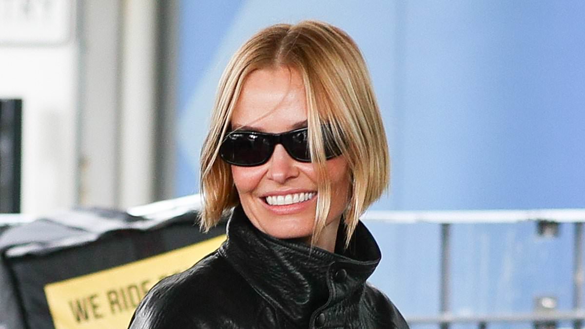 alert-–-lara-worthington-cuts-a-chic-figure-in-black-leather-jacket-as-she-arrives-in-sydney-with-husband-sam-and-their-rarely-seen-three-young-sons