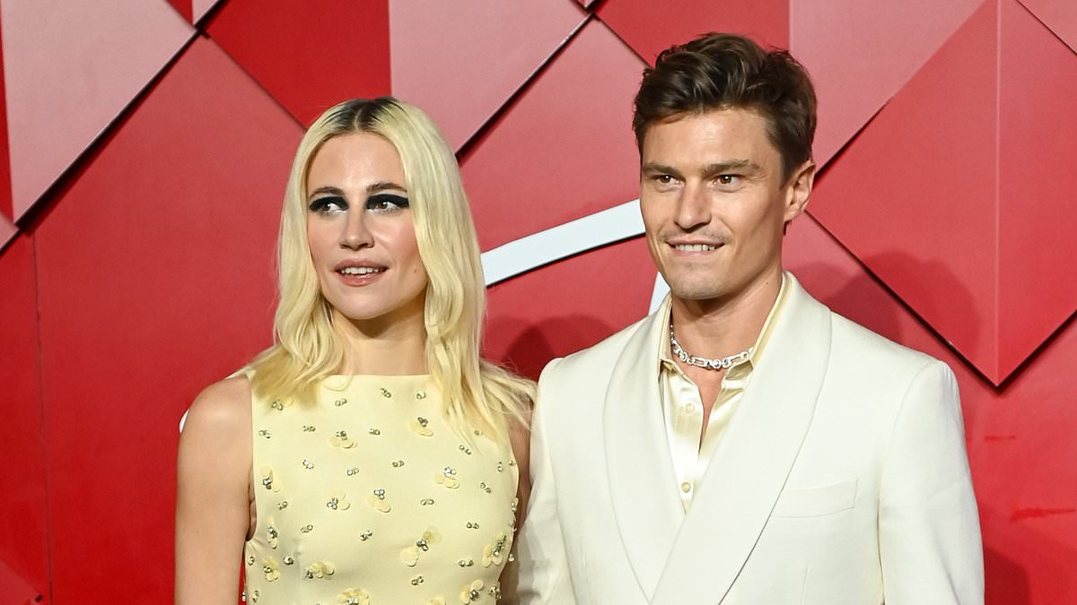 alert-–-pixie-lott-catches-the-eye-in-a-bejewelled-yellow-gown-and-dramatic-eye-make-up-as-she-cosies-up-to-dashing-husband-oliver-cheshire-at-the-2024-fashion-awards