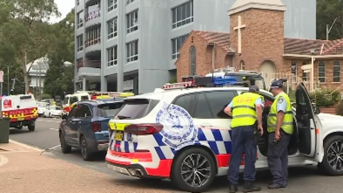 alert-–-major-police-operation-at-gosford,-nsw-as-dozens-of-people-are-evacuated-from-a-building-as-explosions-ring-out