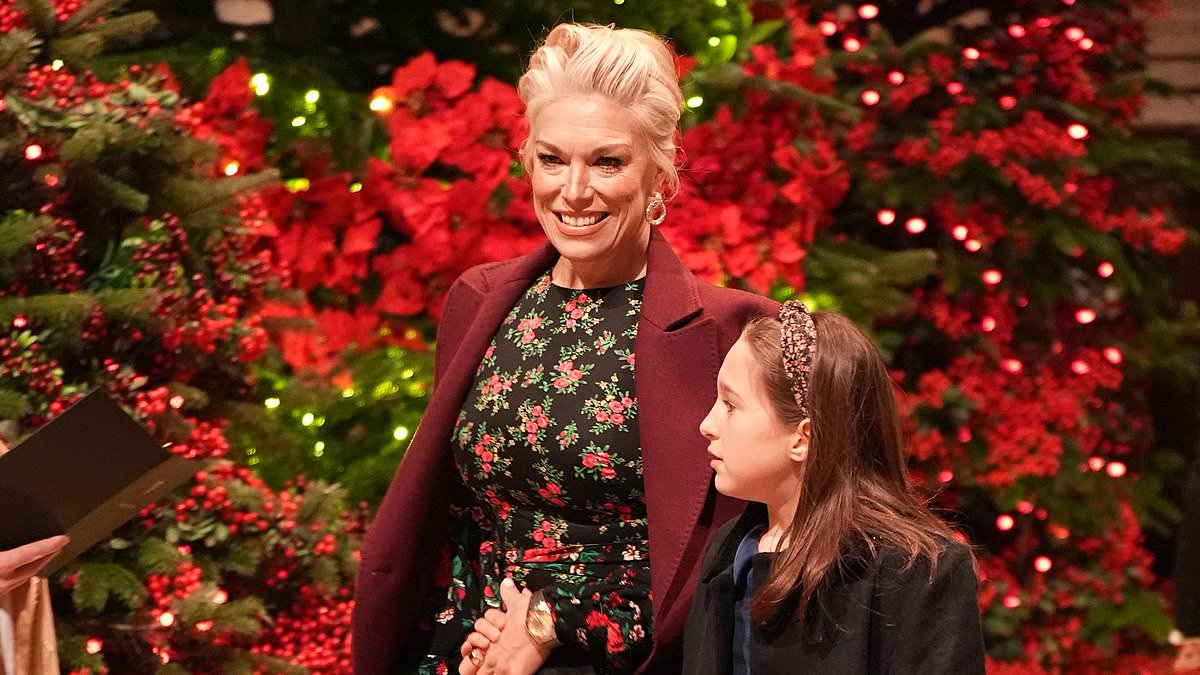 alert-–-hannah-waddingham-cuts-a-stylish-figure-in-a-rose-print-dress-as-she-makes-first-public-appearance-with-daughter-kitty-at-westminster-abbey-carol-concert