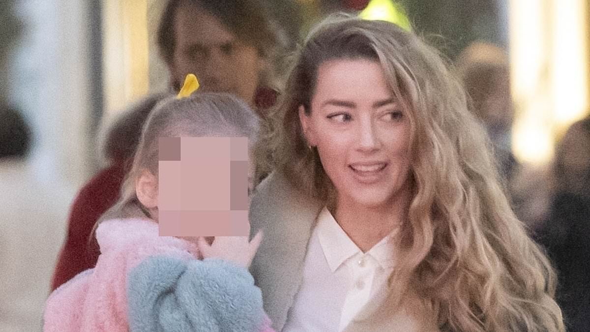 alert-–-amber-heard-takes-daughter-oonagh,-three,-for-a-stroll-in-madrid-after-announcing-she-is-expecting-her-second-child