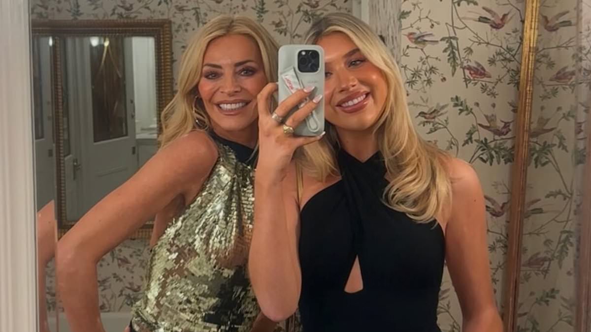 alert-–-tess-daly,-55,-wows-in-gold-figure-hugging-gown-as-she-poses-with-her-lookalike-daughter-phoebe,-20,-for-glamorous-christmas-night-out