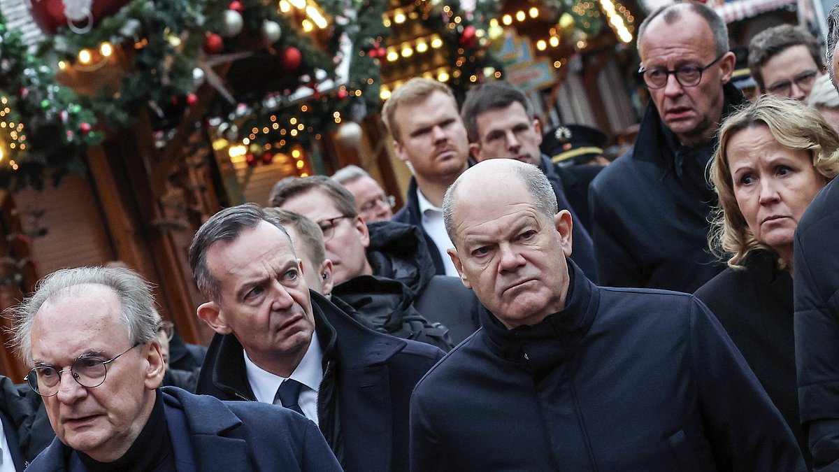 alert-–-moment-german-chancellor-olaf-scholz-is-heckled-by-angry-mob-in-magdeburg-as-questions-remain-over-‘warnings-about-christmas-market-attack-suspect’