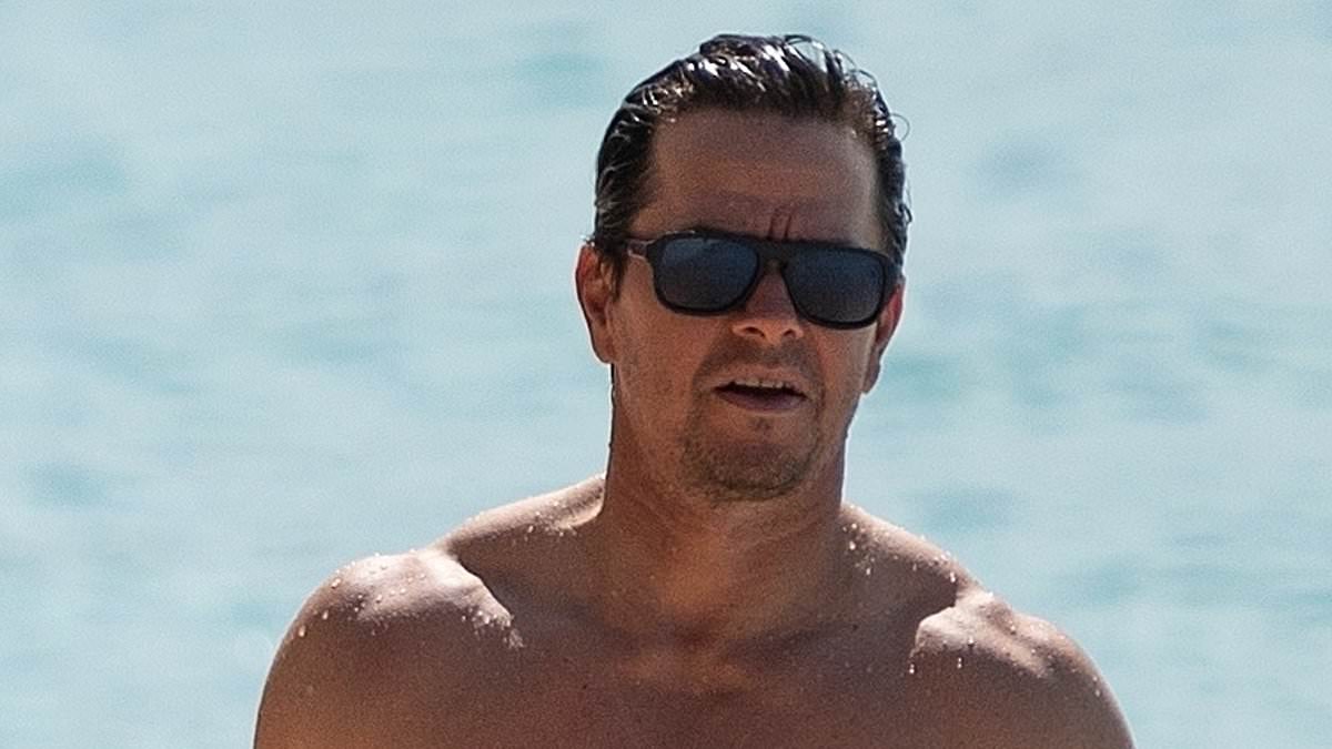 alert-–-mark-wahlberg’s-james-bond-audition!-star,-53,-channels-daniel-craig-as-he-shows-off-his-chiselled-abs-while-on-holiday-with-his-bikini-clad-wife rhea-durham-in-barbados