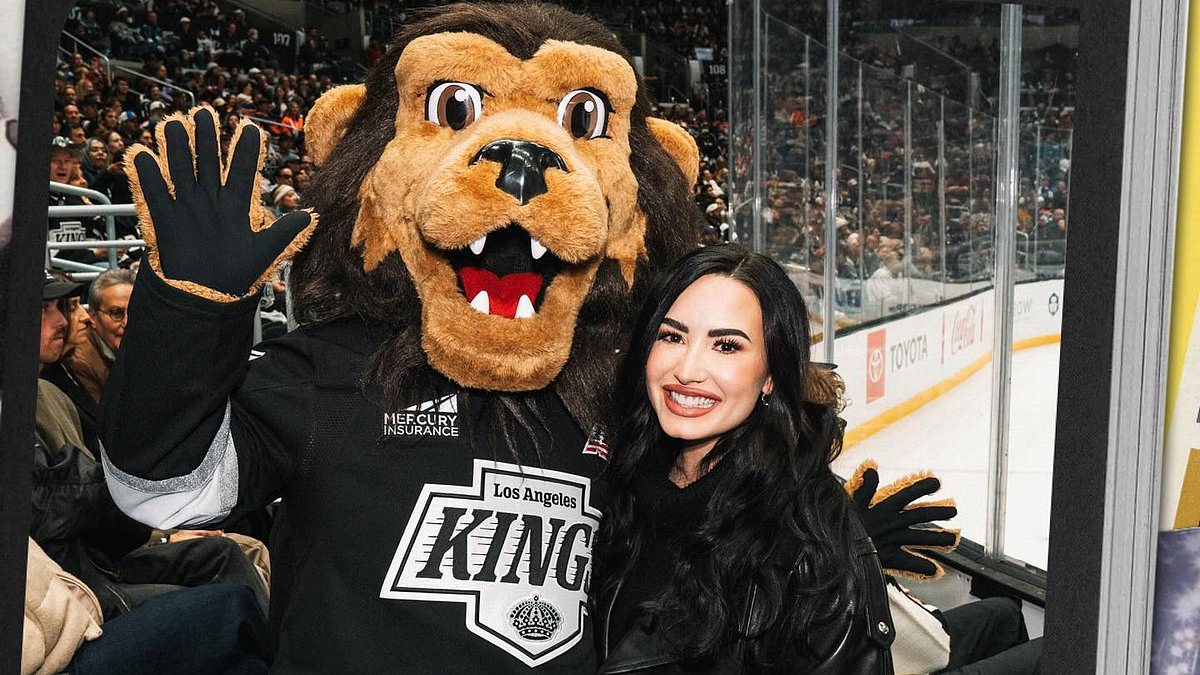 alert-–-demi-lovato-checks-out-hockey-game-in-la-with-fiance-jutes-(and-reunites-with-former-co-star-will-ferrell!)