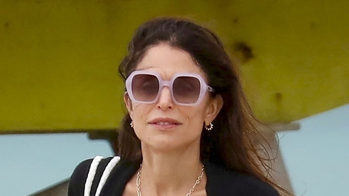 alert-–-bethenny-frankel,-54,-wows-in-a-blue-swimsuit-as-she-enjoys-family-beach-break-in-miami