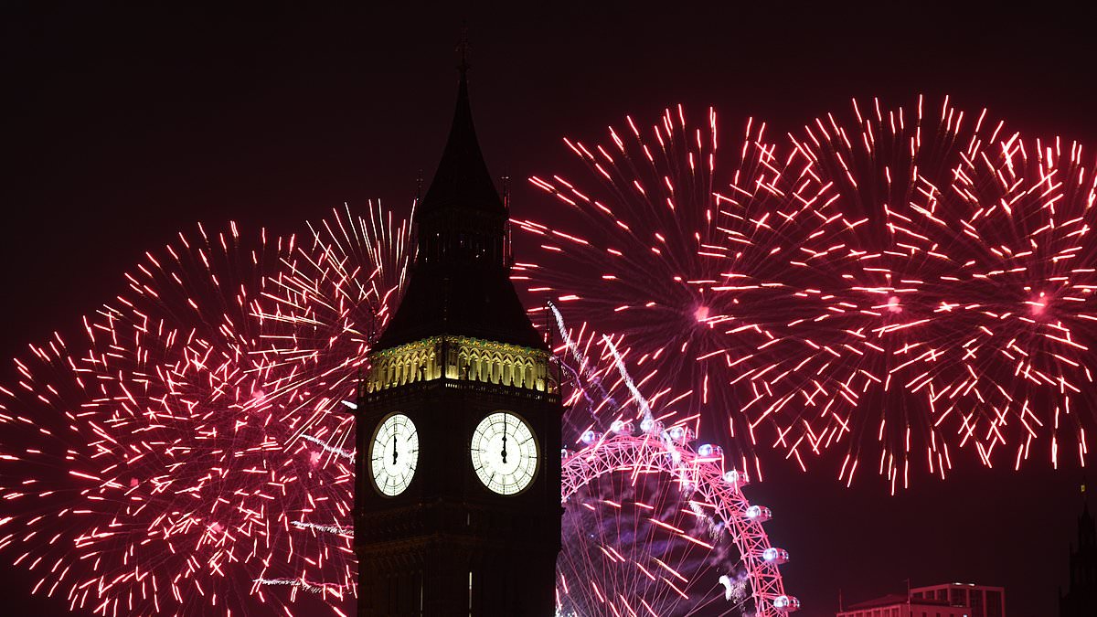 alert-–-hardy-brits-ignore-gale-warnings-and-torrential-downpours-to-see-in-the-new-year-in-style-–-as-traditional-fireworks-light-up-big-ben-in-spite-of-storm-fears-that-forced-many-displays-to-be-axed