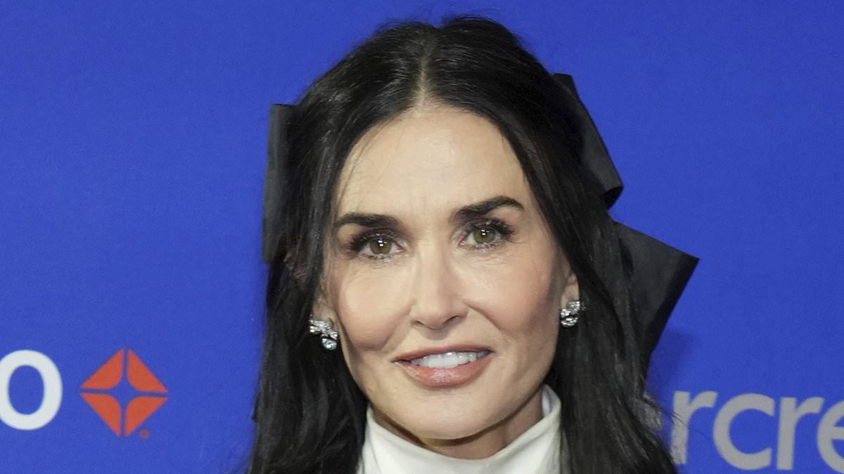 alert-–-demi-moore,-62,-looks-ageless-in-a-chic-black-velvet-suit-as-she-attends-palm-springs-film-festival-awards