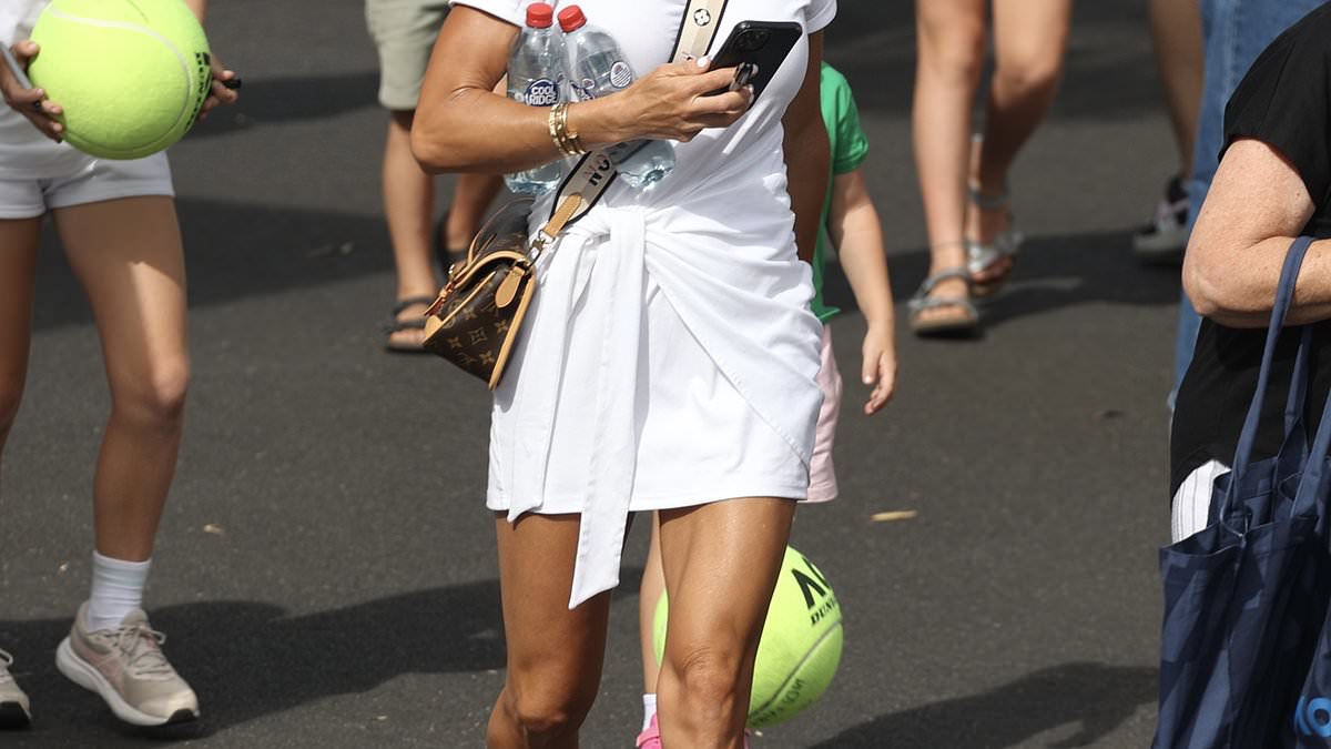 alert-–-candice-warner-puts-on-a-very-leggy-display-in-a-flirty-mini-dress-as-she-fangirls-over-world-tennis-number-one-aryna-sabalenka-during-australian-open-practice