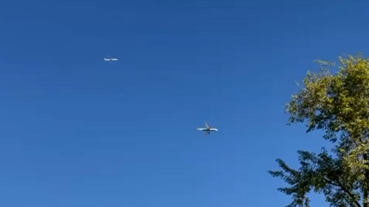 alert-–-terrifying-moment-two-passenger-jets-come-perilously-close-to-a-midair-collision-as-they-approach-to-land-at-phoenix-airport-before-anti-crash-system-kicks-in