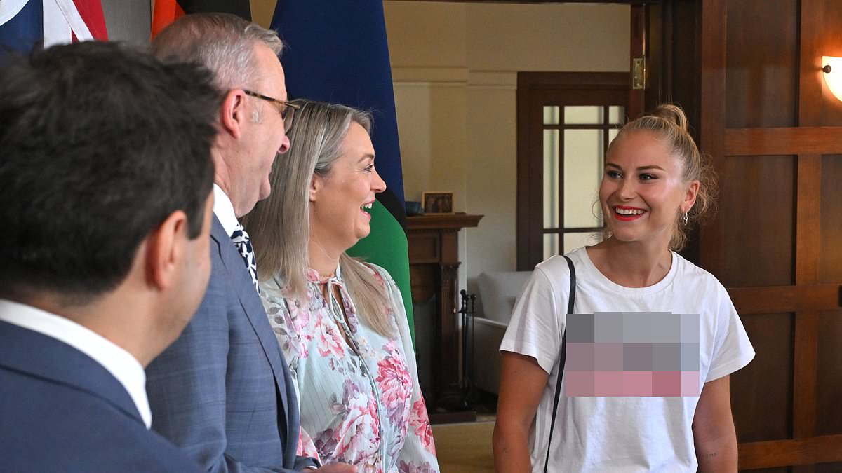 alert-–-grace-tame-displays-inappropriate-two-word-t-shirt-message-as-she-arrives-to-meet-anthony-albanese-at-the-australian-of-the-year-morning-tea