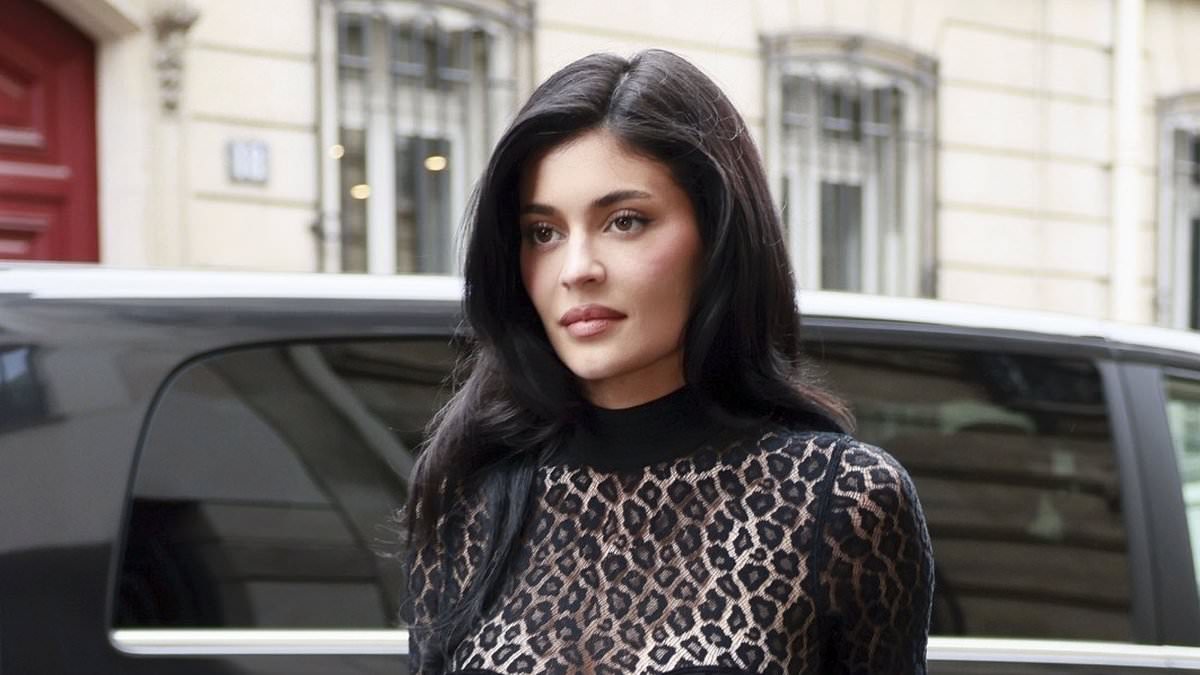 alert-–-kylie-jenner-puts-on-a-leggy-display-in-figure-hugging-black-mini-dress-as-she-grabs-lunch-during-outing-in-paris