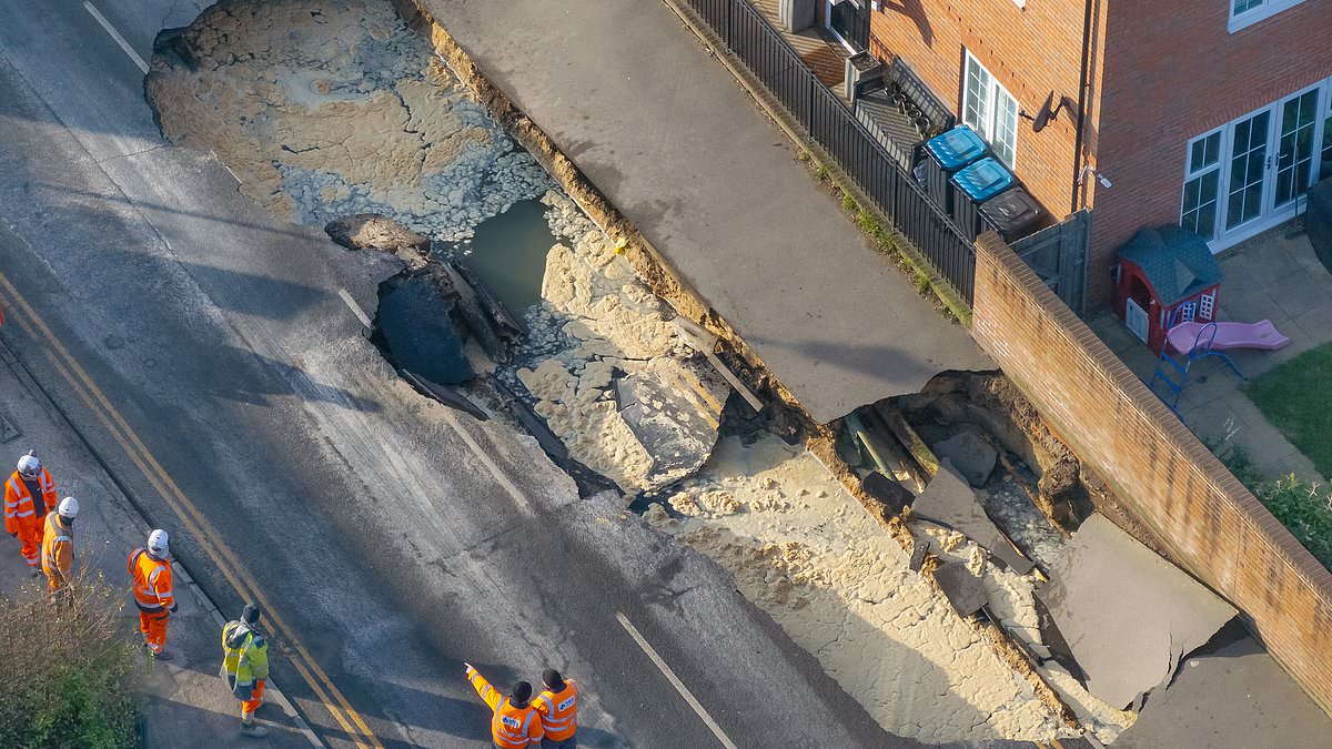 alert-–-residents-are-evacuated-from-their-homes-after-huge-sinkhole-swallows-part-of-high-street