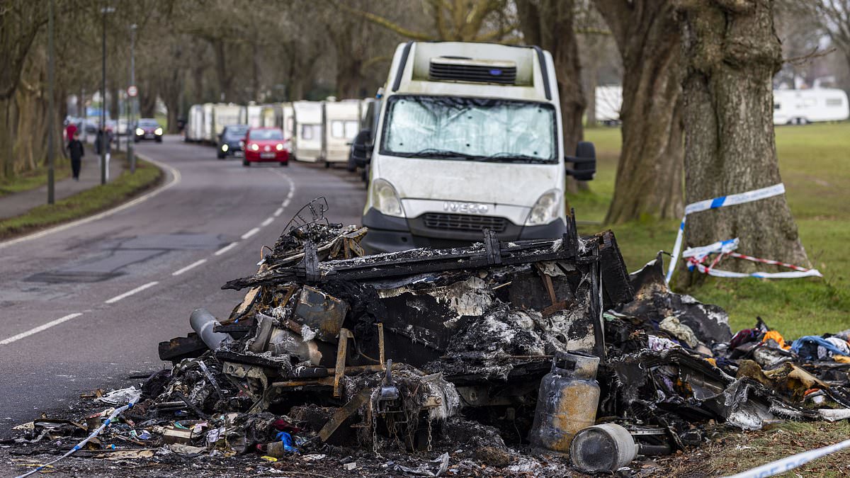 alert-–-fear-and-loathing-in-our-increasingly-violent-‘caravan-city’:-van-dwellers-arm-themselves-with-axes-and-baseball-bats-as-tensions-flare-with-locals-after-‘arson’-attack-on-motorhome