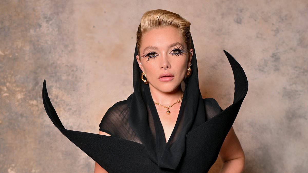 alert-–-florence-pugh-looks-incredible-in-black-sheer-hooded-dress-as-she-takes-to-the-runway-for-harris-reed-during-london-fashion-week