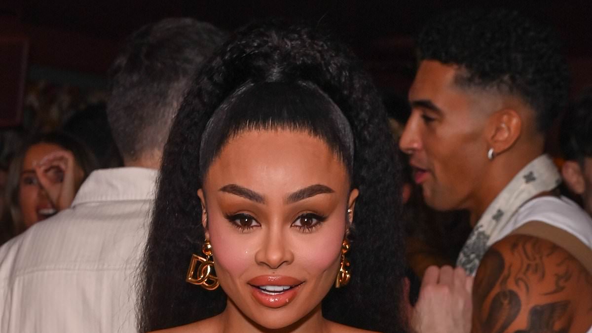 alert-–-blac-chyna,-36,-cuts-a-trendy-figure-in-a-90s-inspired-denim-co-ord-as-she-attends-the-coracho-tequila-london-fashion-week-party