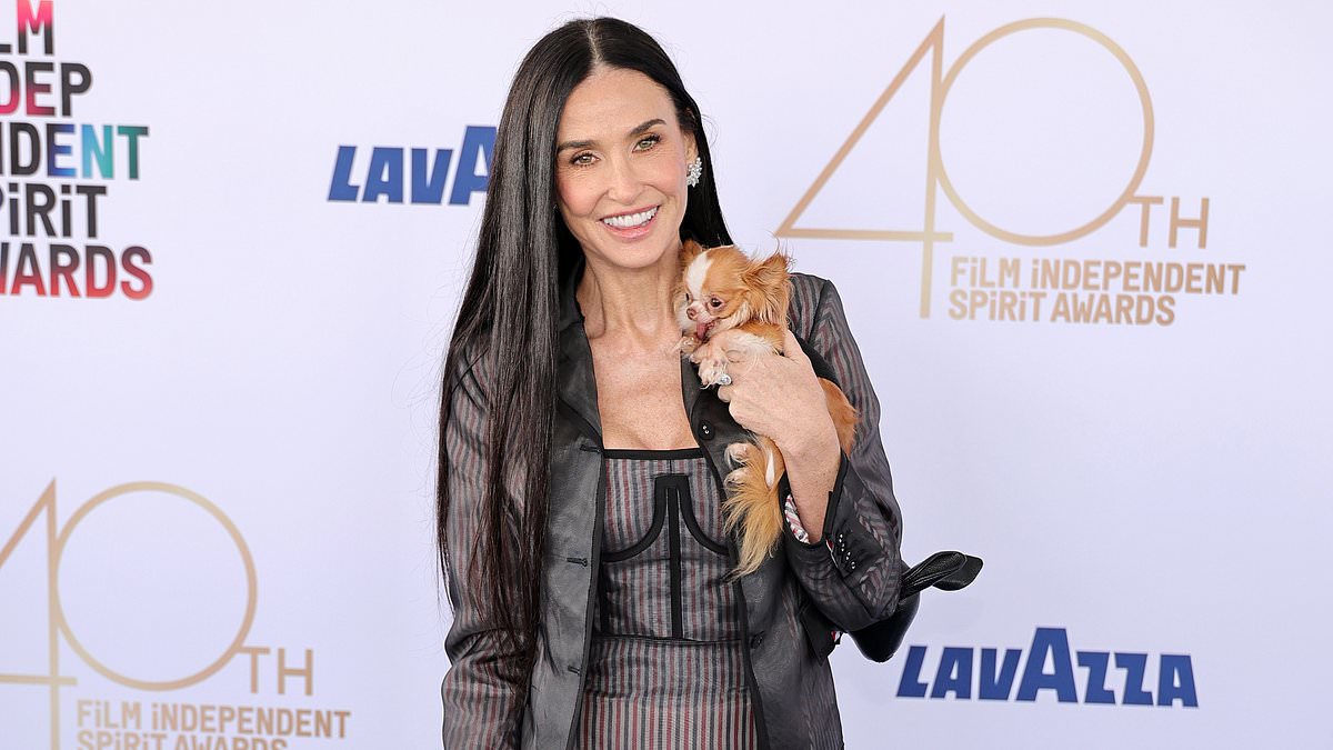 alert-–-demi-moore-is-radiant-as-she-cradles-her-adorable-pooch-pilaf-on-red-carpet-at independent-spirit-awards-2025