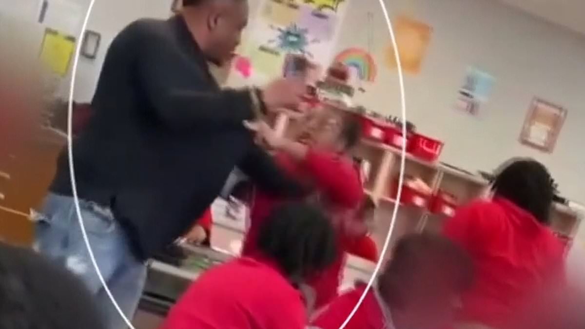 alert-–-moment-male-teacher-fights-with-girl,-13,-after-trying-to-stop-her-watching-movie-on-her-phone-during-class