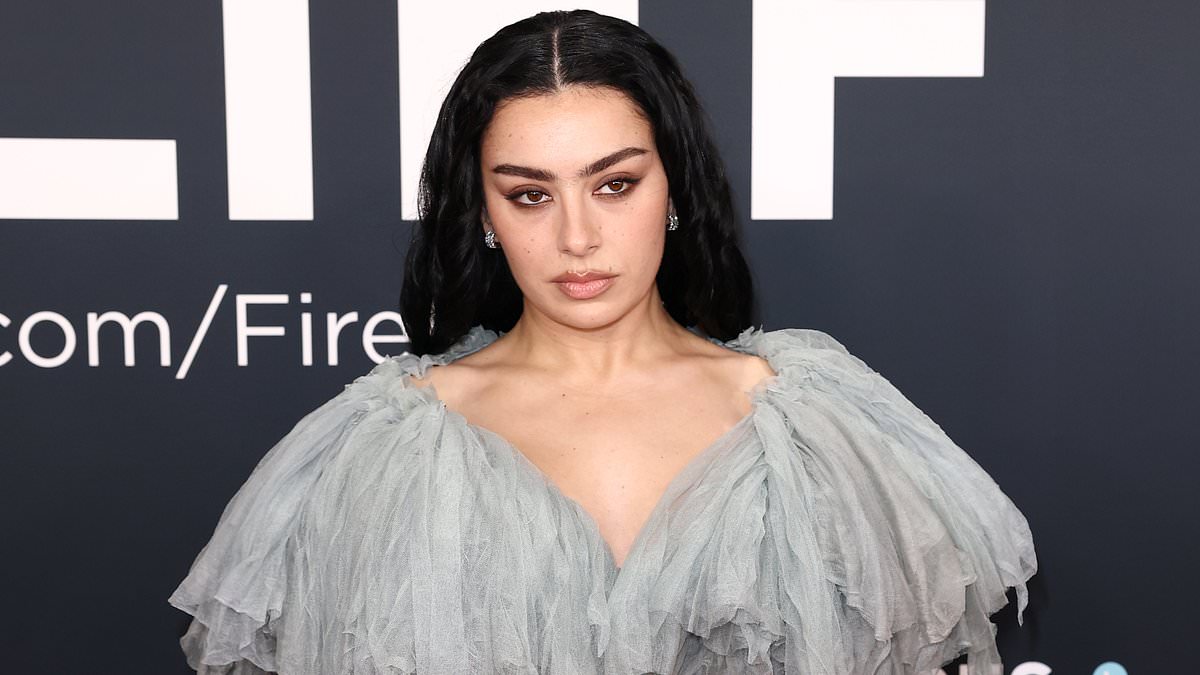 alert-–-charli-xcx-puts-on-a-very-leggy-display-in-a-dramatic-ruffled-gown-with-racy-thigh-high-slit-as-she-joins-raye-and-cynthia-erivo-leading-the-british-glamour-at-the-2025-grammy-awards