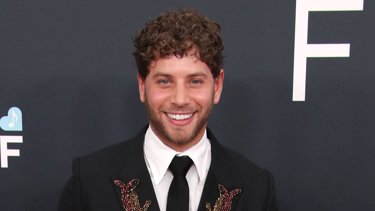 alert-–-love-island-star-eyal-booker-makes-unlikely-appearance-at-67th-grammy-awards-in-los-angeles-as-he-takes-to-the-red-carpet-in-a-bejewelled-suit