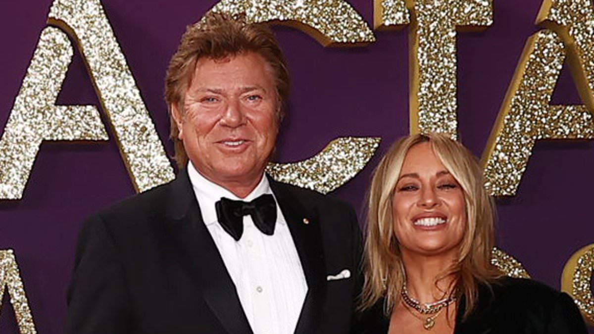 alert-–-richard-wilkins-and-his-girlfriend-mia-hawkswell-put-on-loved-up-display-as-they-lead-arrivals-at 2025-aacta-awards