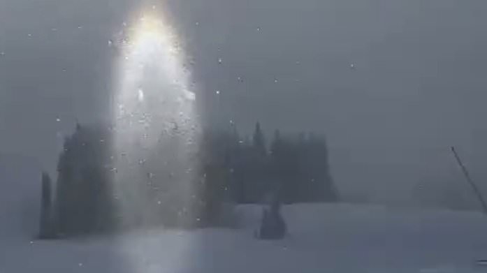 alert-–-skier-films-‘portal-to-another-world’-as-bizarre-column-of-light-forms-in-front-of-them-in-austrian-snowstorm