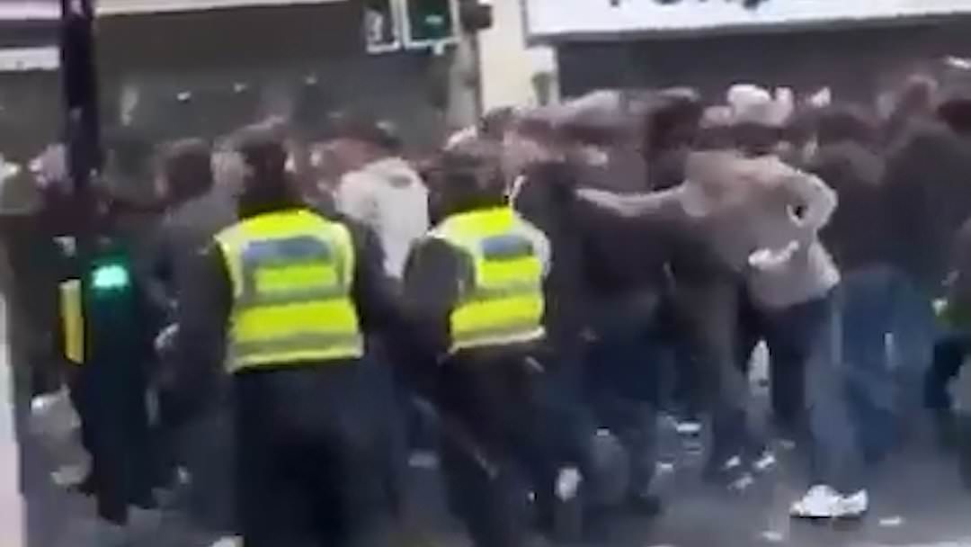 alert-–-shocking-moment-violent-mob-rampages-through-city-centre-attacking-buses-and-clashing-with-police