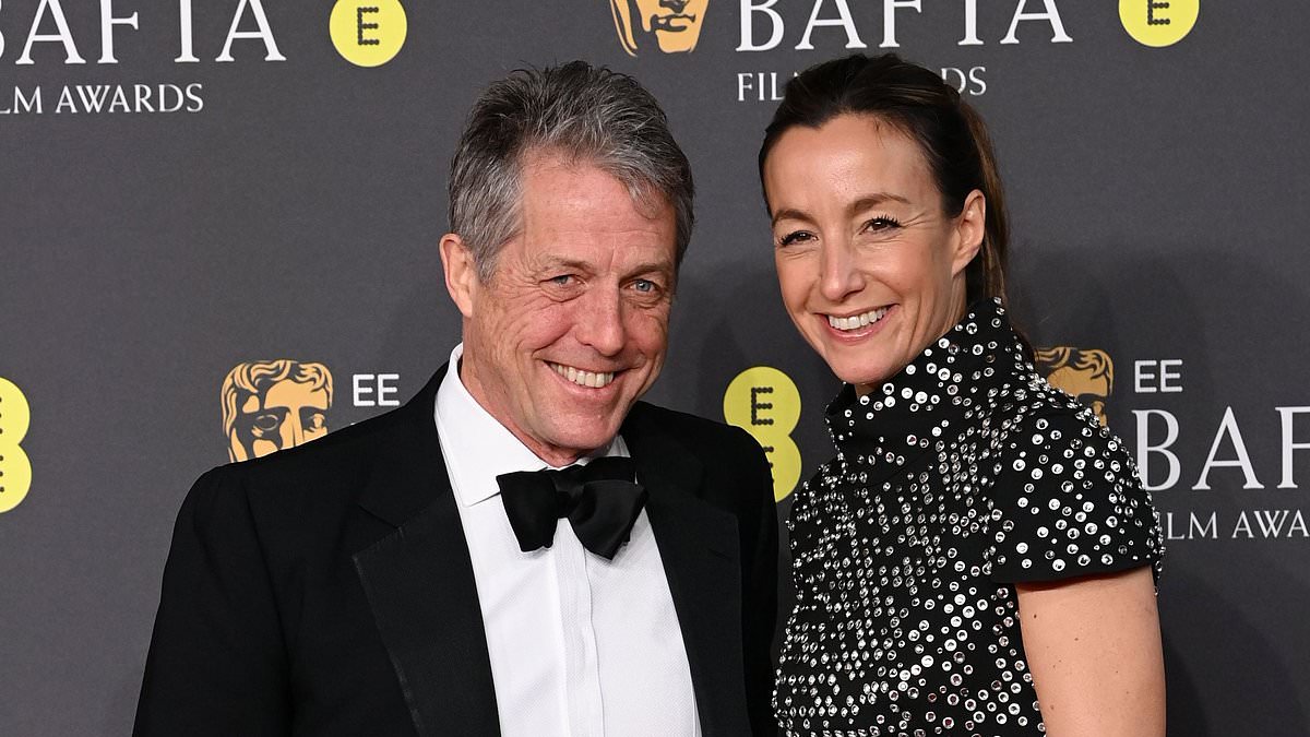 alert-–-hugh-grant,-64,-cuts-a-dapper-figure-as-he-joins-leggy-wife anna-eberstein,-42,-for-rare-red-carpet-appearance-at-the-2025-baftas