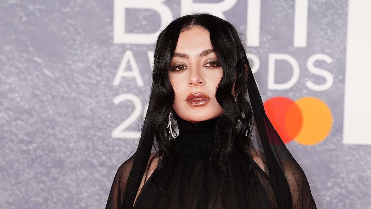 alert-–-charli-xcx-puts-on-a-very-racy-display-as-she-flaunts-her-incredible-figure-in-an-edgy-sheer-gown-at-the-2025-brit-awards