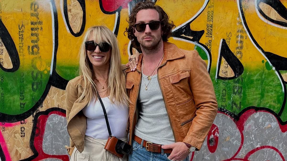 alert-–-aaron-taylor-johnson,-34,-kisses-wife-sam-as-he-celebrates-her-58th-birthday-with-a-series-of-unseen-photos-–-including-a-snap-of-the-bikini-clad-director-doing-the-splits