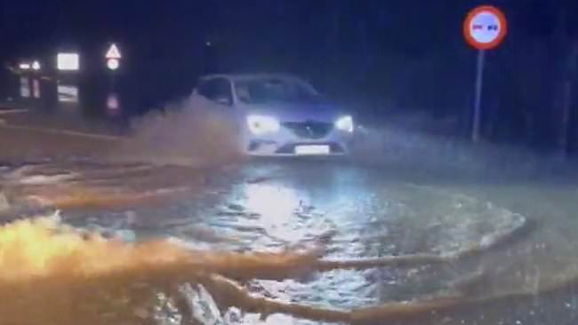 alert-–-now-spanish-mainland-is-hammered-by-floods-with-‘worst-yet-to-come’-as-videos-show-roads-transformed-into-raging-rivers-near-tourist-hotspots-after-canary-islands-was-hit-by-record-rainfall