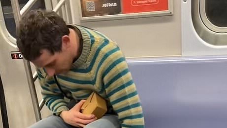 alert-–-commuter-shocked-as-they-spot-netflix-star-cuddling-their-dog-on-the-tube-–-would-you-have-noticed-him?