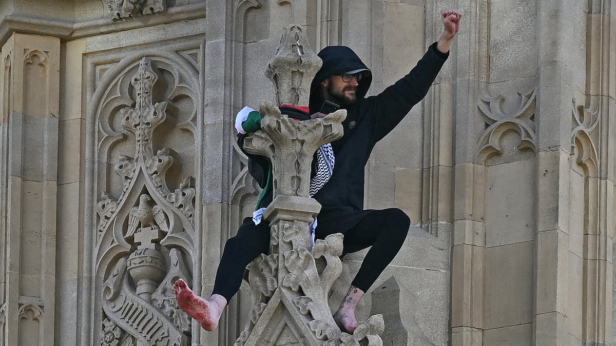 alert-–-barefoot-pro-palestine-protester-climbs-big-ben’s-elizabeth-tower-as-tours-of-parliament-are-cancelled-and-key-central-london-route-is-brought-to-a-standstill