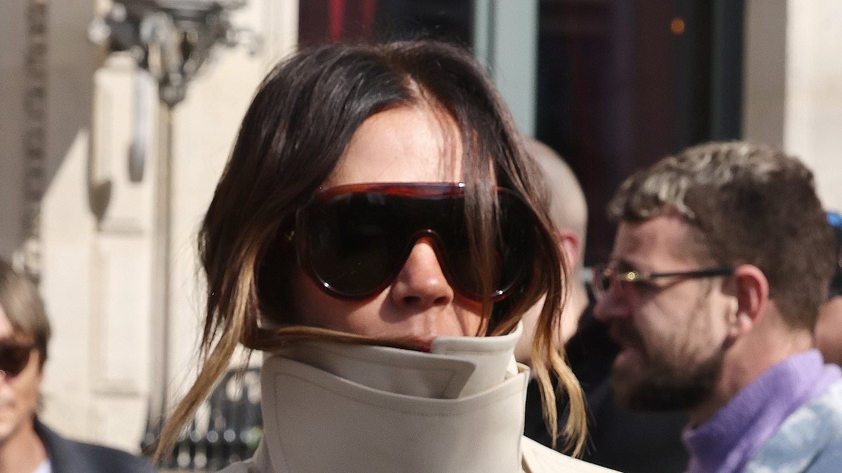 alert-–-victoria-beckham-wraps-up-in-a-stylish-cream-maxi-coat-as-she-departs-her-hotel-alongside-her-famous-family-following-paris-fashion-week-show